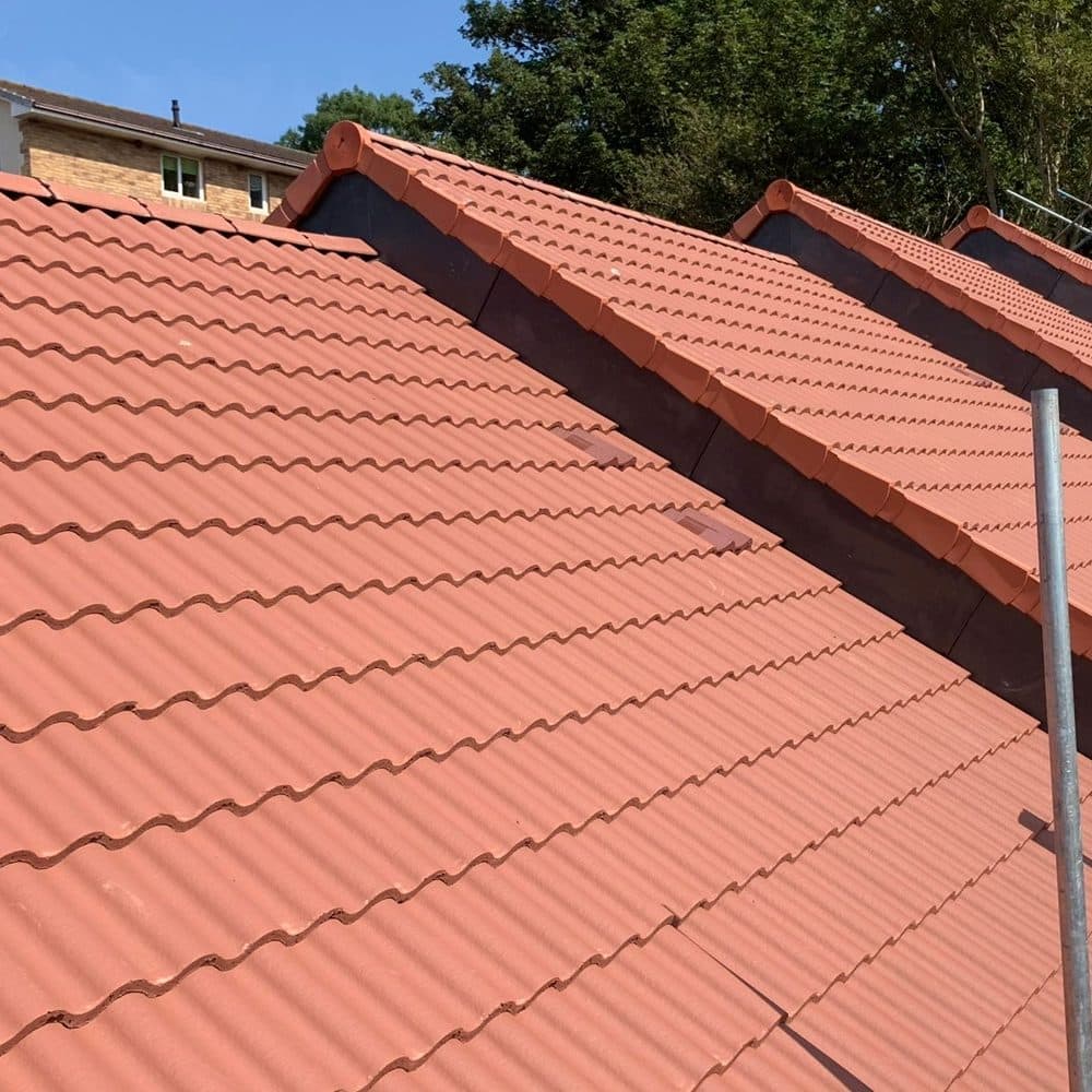 A newly tiled roof with the scaffolding still up